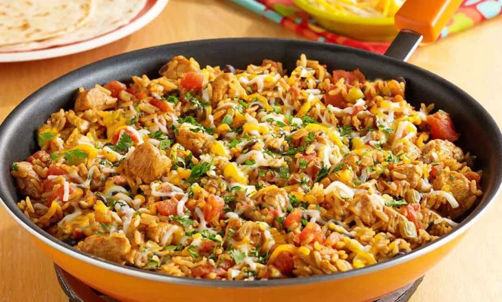 Burani Verore me Speca, Domate dhe Oriz – Receta me Shije të Përsosur