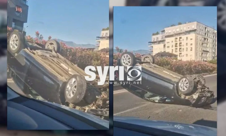 VIDEO/ Aksident në Tiranë, makina përmbyset në mes të rrugës