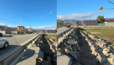 Dëmtohen rrjetet nëntokësore/ Trotuar i shembur në aksin Pogradec–Qafë Plloçë