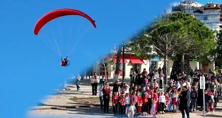 VIDEO / Në Himarë, Babagjyshi zbret nga qielli me parashutë