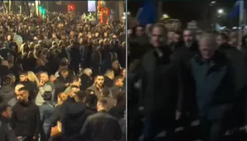 Berisha del nga selia blu, bashkë me tubuesit marshojnë drejt Kryeministrisë, mbajnë flamujt e BE