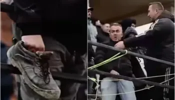 Tensione në tribunën e stadiumit, tifozi heq këpucën dhe bën gjeste të pahijshme ndaj trajnerit shqiptar (Video)