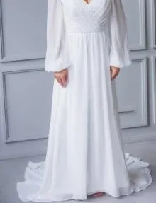 Kur një femër vesh një fustan të bardhë?