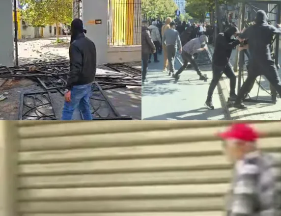 Studentët shkulin sërish kangjellat dhe gjuajnë me pllaka guri, Policia qëndron brenda godinës. Bizneset ulin qepenat